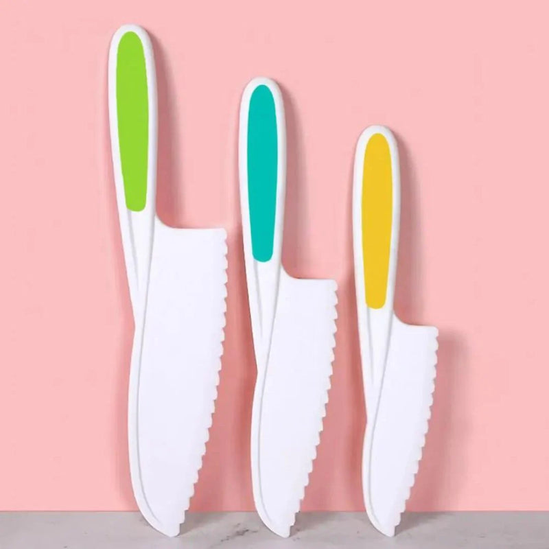 Plastic Knife Set with Toddler Knife, Peeler, Cookie Cutter, and Cutting Board (Random Color) - Montessori Skills